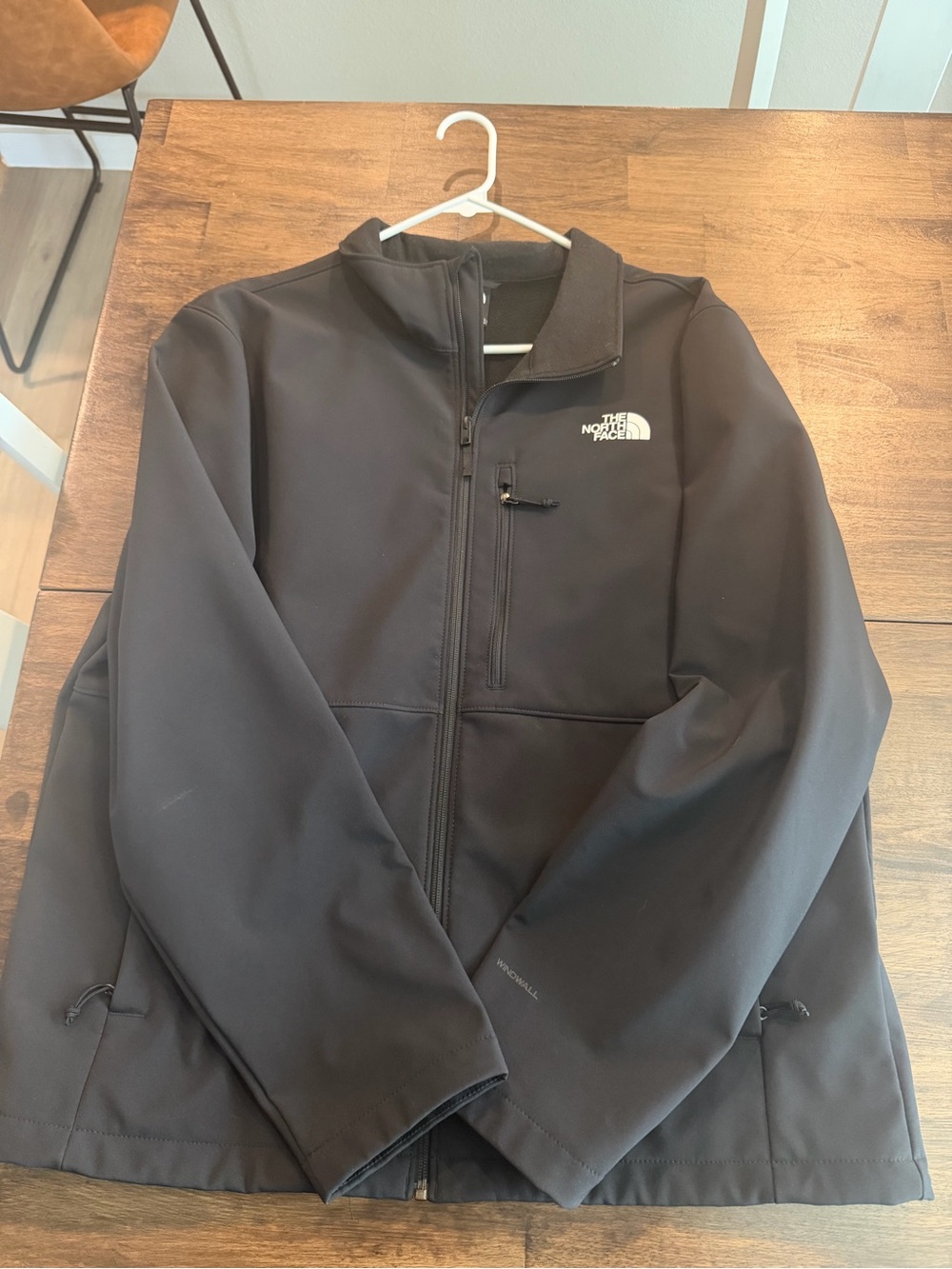 The North Face Black Softshell Jacket with Chest Zip Pocket